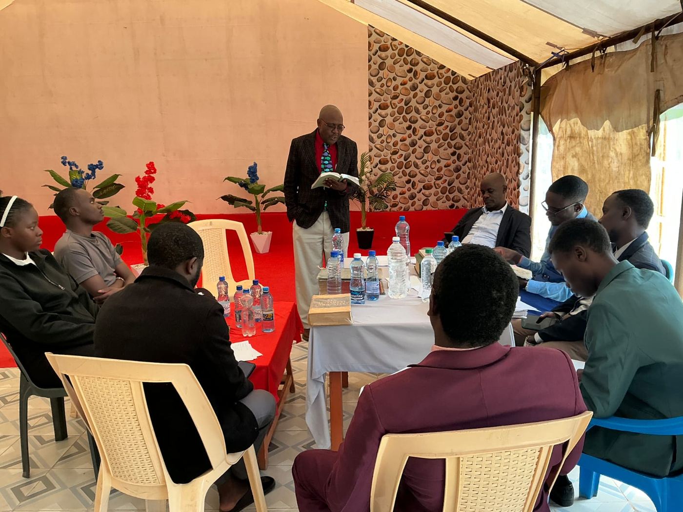 RPL candidates reviewing a portfolio of evidence with an assessor